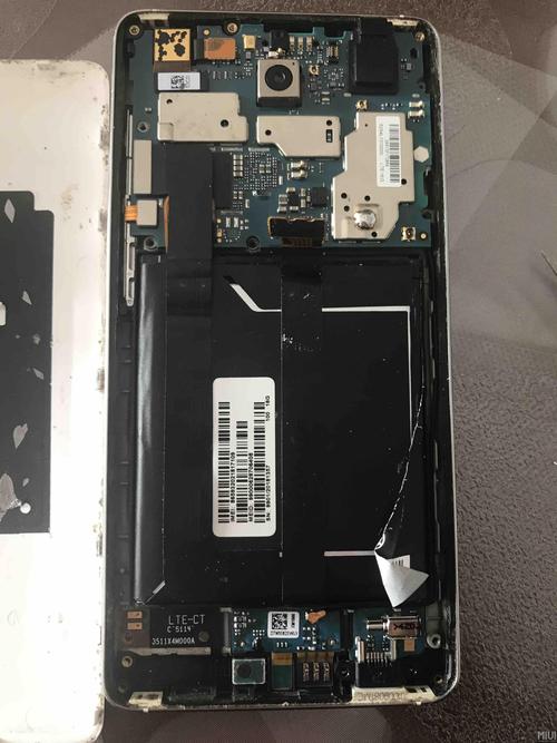 小米手机4的后盖怎么拆?好拆吗?